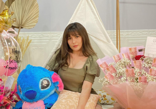 Tulis Kalimat Perpisahan, Angela Lee Akui Telah Cerai dari Sang Suami